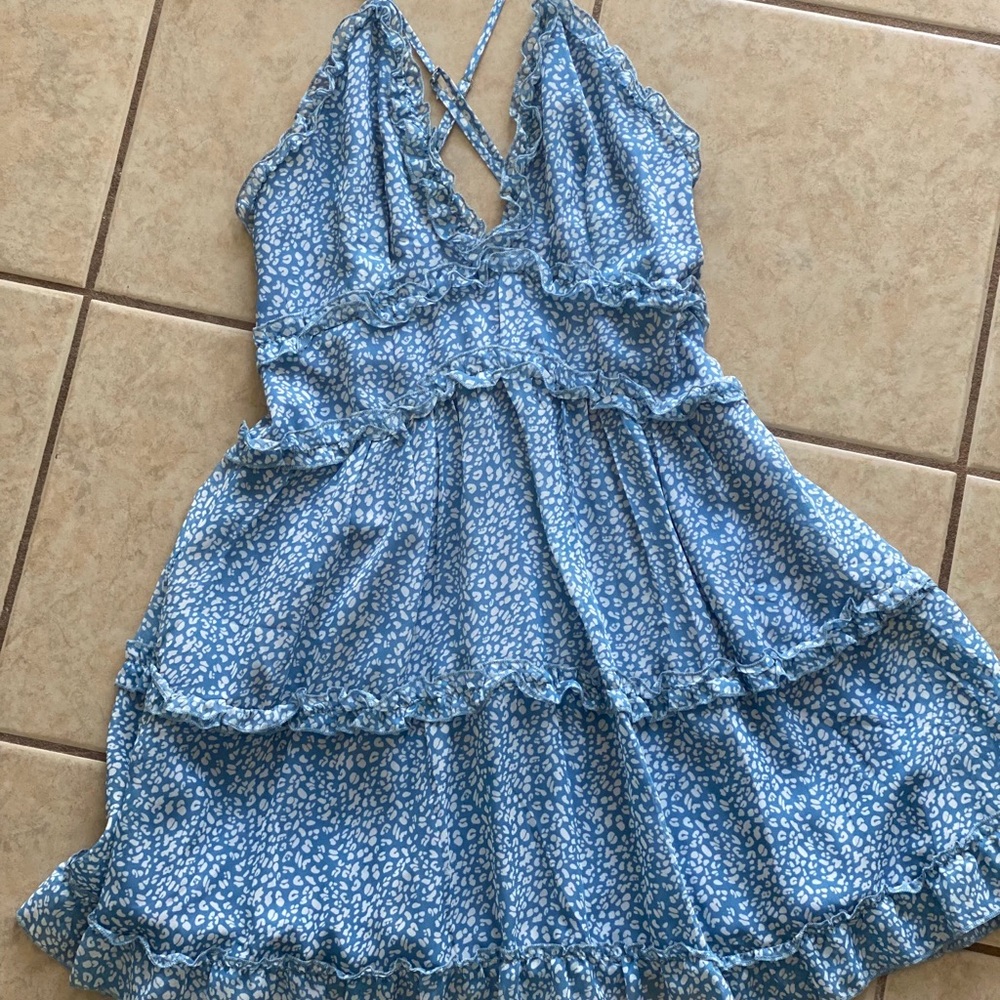 Leopard print ruffle dress with low front and open back